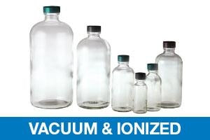 Qorpak Vacuum / Ionized Clear Glass Boston Round Bottles with Caps - Vacuum and Ionized Boston Round Bottle with PTFE-Lined Cap, Clear, 1 oz. - GLC-01085