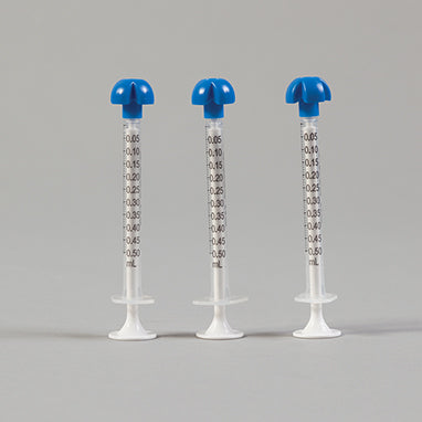 Comar® Oral Dispensers with Tip Caps, 0.5mL, Clear with White Plunger